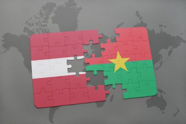 Letonya ve burkina faso ulusal bayrak bir dünya haritası üzerinde ile bulmaca