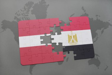 Letonya ve Mısır ulusal bayrak bir dünya haritası üzerinde ile bulmaca