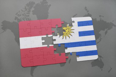 Letonya ve uruguay ulusal bayrak bir dünya haritası üzerinde ile bulmaca