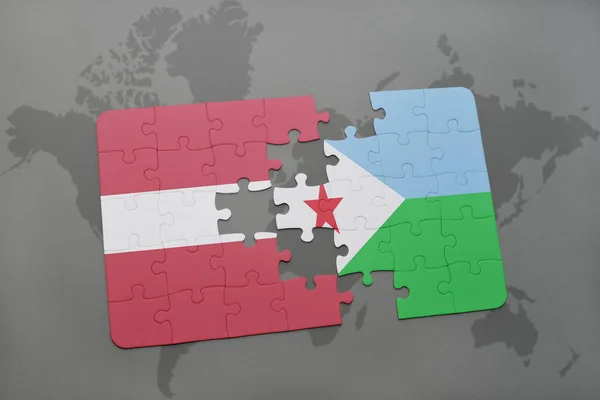 Головоломка с национальным флагом Латвии и Джибути на карте мира — стоковое фото
