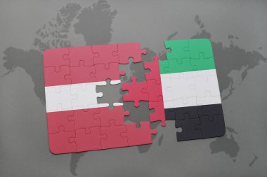 bir dünya haritası üzerinde Letonya ve Birleşik Arap Emirlikleri bayrağı ulusal ile bulmaca