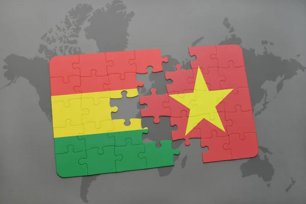 Rompecabezas con la bandera nacional de Bolivia y Vietnam en un mapa del mundo —  Fotos de Stock