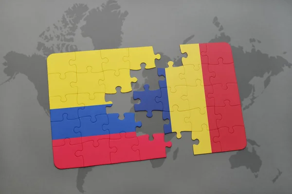 Quebra-cabeça com a bandeira nacional da colômbia e chad em um mapa do mundo — Fotografia de Stock