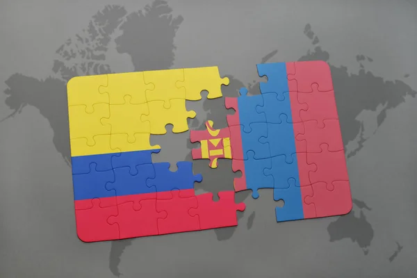 Quebra-cabeça com a bandeira nacional da colômbia e mongólia em um mapa do mundo — Fotografia de Stock