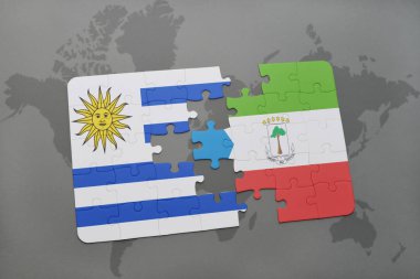 uruguay ve Ekvator Ginesi ulusal bayrak bir dünya haritası üzerinde ile bulmaca