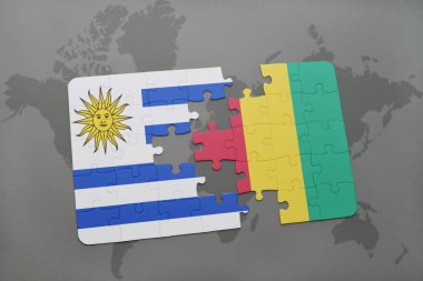 uruguay ve bir dünya haritası üzerinde Gine bayrağı ile bulmaca