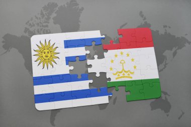 uruguay ve Tacikistan Ulusal bayrak bir dünya haritası üzerinde ile bulmaca