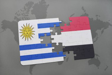 bir dünya haritası üzerinde uruguay ve yemen bayrak ulusal ile bulmaca