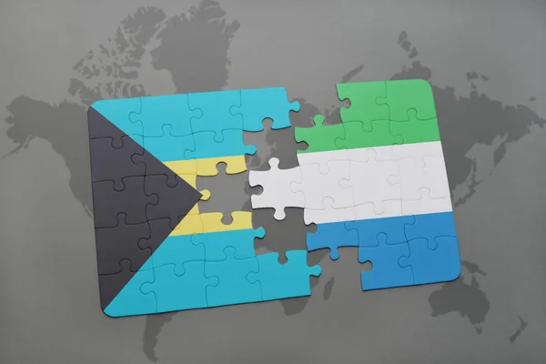 Puzzle with the national flag of bahamas and sierra leone on a world map — Stock Photo, Image