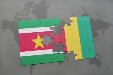 Surinam ve bir dünya haritası üzerinde Gine bayrağı ile bulmaca