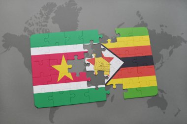 Surinam ve Zimbabve Ulusal bayrak bir dünya haritası üzerinde ile bulmaca