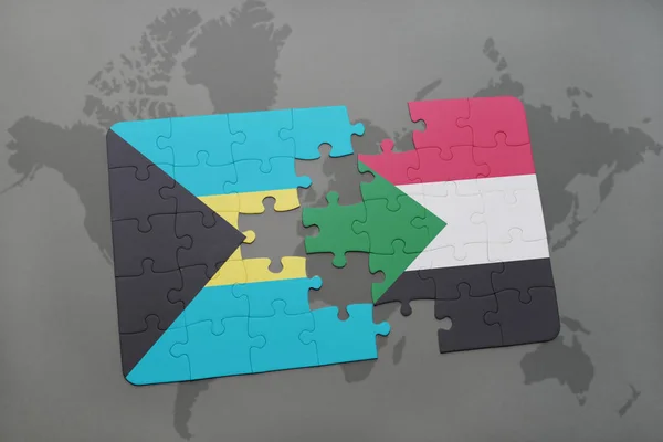 Puzzle z Flaga narodowa Bahamy i Sudanu na mapie świata — Zdjęcie stockowe