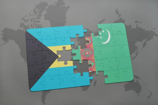 Puzzel met de nationale vlag van Bahama's en turkmenistan op een wereldkaart — Stockfoto