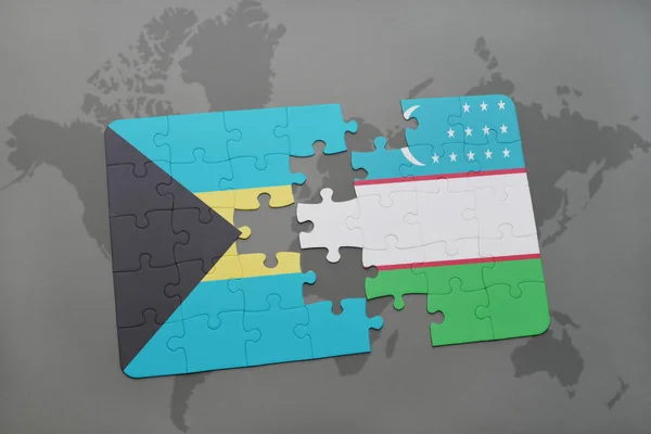 Puzzel met de nationale vlag van Bahama's en Oezbekistan op een wereldkaart — Stockfoto