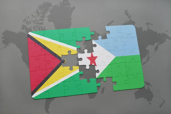 Rompecabezas con la bandera nacional de Guayana y Djibouti en un mapa del mundo — Foto de Stock