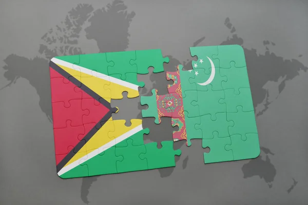 Rompecabezas con la bandera nacional de Guyana y Turquía en un mapa del mundo — Foto de Stock