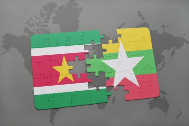 bir dünya haritası üzerinde Surinam ve myanmar bayrağı ulusal ile bulmaca