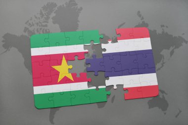 Surinam ve Tayland ulusal bayrak bir dünya haritası üzerinde ile bulmaca