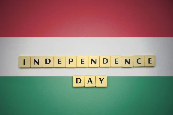 Letters with text independence day on the national flag of hungary. — Stock Photo, Image