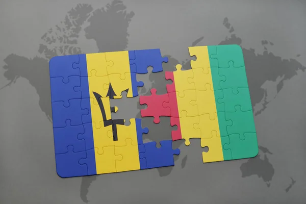 バルバドス、世界地図上ギニアの国旗をパズルします。 — ストック写真