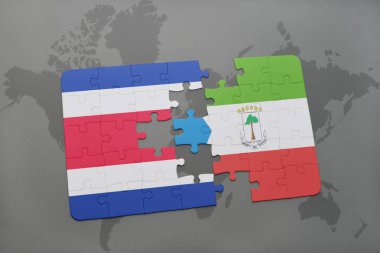 Kosta Rika ve Ekvator Ginesi ulusal bayrak bir dünya haritası üzerinde ile bulmaca