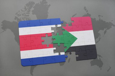 Kosta Rika ve sudan bir dünya haritası üzerinde bayrağı ile bulmaca