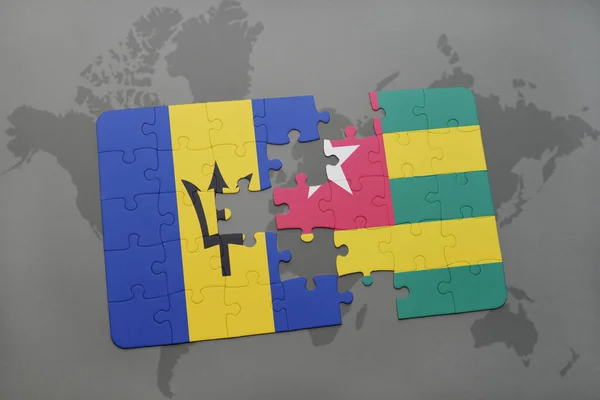 Puzzel met de nationale vlag van barbados en togo op een wereldkaart — Stockfoto