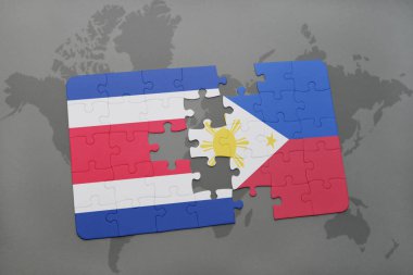 Kosta Rika ve Filipinler ulusal bayrak bir dünya haritası üzerinde ile bulmaca