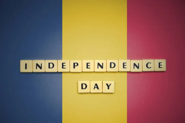 Letters with text independence day on the national flag of chad. — Stock Photo, Image