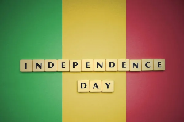 Irodalom-val szöveg függetlenség napja mali zászlaja. — Stock Fotó