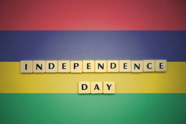 Irodalom-val szöveg függetlenség napja mauritius zászlaja. — Stock Fotó