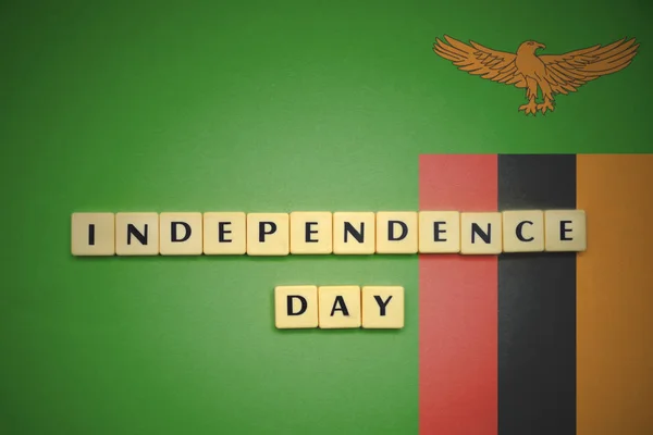 Letters with text independence day on the national flag of zambia. — Stock Photo, Image