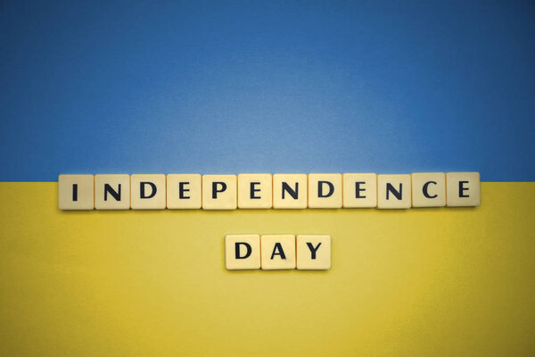letters with text independence day on the national flag of ukraine.