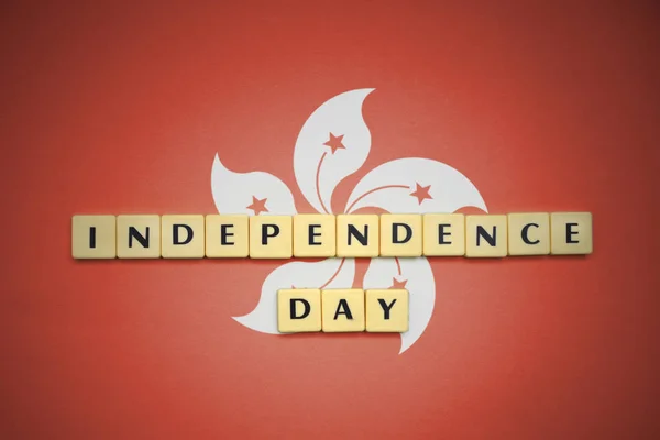 Letters with text independence day on the national flag of hong kong. — Stock Photo, Image