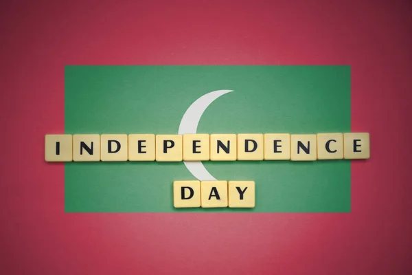 몰디브의 국기에 텍스트 독립 기념일과 편지. — 스톡 사진