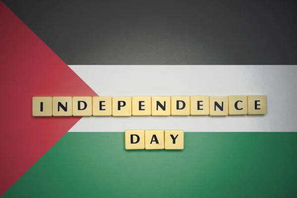 Letters with text independence day on the national flag of palestine. — Stock Photo, Image