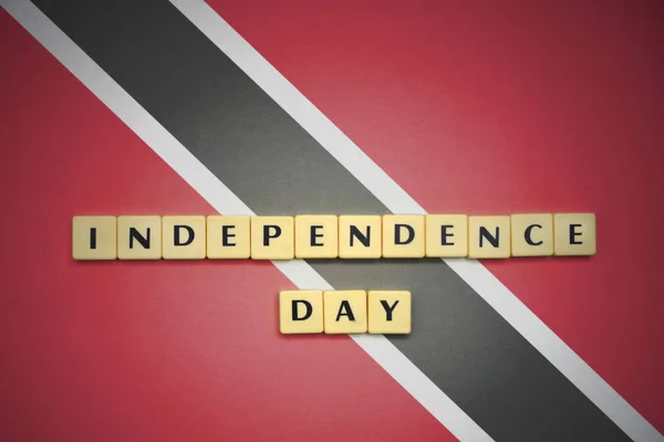 Letters with text independence day on the national flag of trinidad and tobago. — Stock Photo, Image