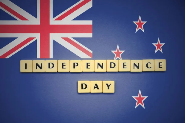 Irodalom-val szöveg függetlenség napja a Új-Zéland zászlaja. — Stock Fotó