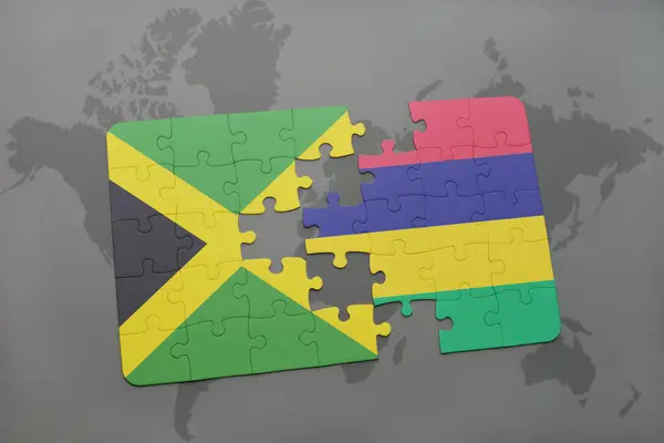 Puzzle with the national flag of jamaica and mauritius on a world map — Stock Photo, Image