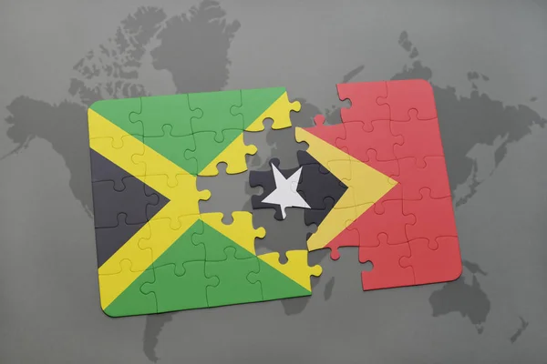 Rompecabezas con la bandera nacional de jamaica y Timor Oriental en un mapa del mundo — Foto de Stock