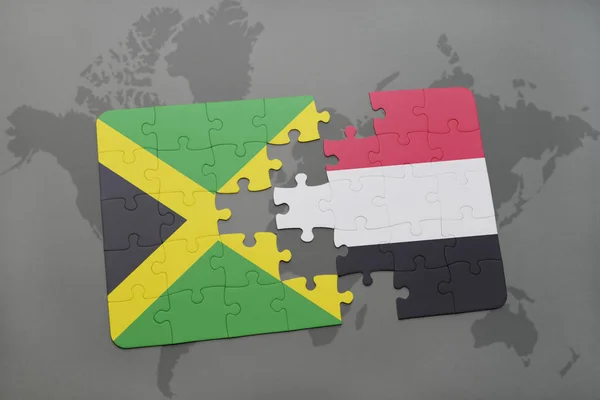 Rompecabezas con la bandera nacional de jamaica y yemen en un mapa del mundo — Foto de Stock