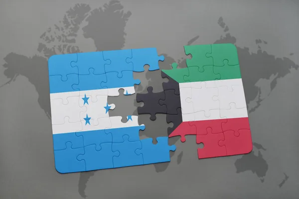 Honduras ve Kuveyt ulusal bayrak bir dünya haritası üzerinde ile bulmaca — Stok fotoğraf