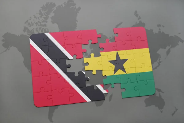 Puzzle avec le drapeau national de Trinidad et tobago et ghana sur une carte du monde — Photo
