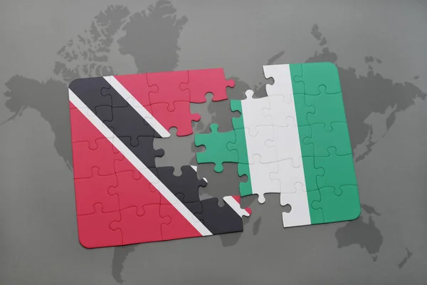 Puzzle avec le drapeau national de Trinidad et tobago et nigeria sur une carte du monde — Photo