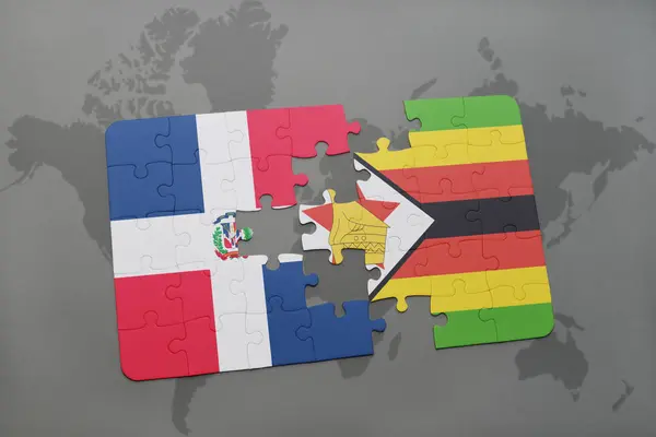Puzzle s státní vlajka Dominikánské republiky a zimbabwe na mapě světa — Stock fotografie