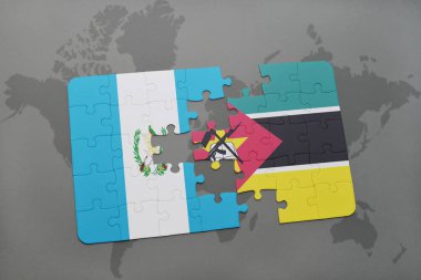 guatemala ve Mozambik bir dünya haritası üzerinde bayrağı ile bulmaca