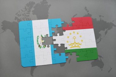 guatemala ve Tacikistan Ulusal bayrak bir dünya haritası üzerinde ile bulmaca