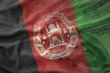renkli bir Amerikan Doları para arka plan Afganistan'ın ulusal bayrağını sallıyor. Ekonomi kavramı
