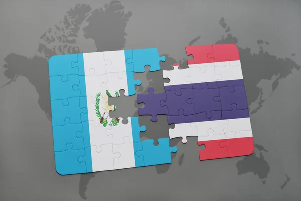 Загадка з національним прапором Гватемали і Таїланду на карті світу — стокове фото