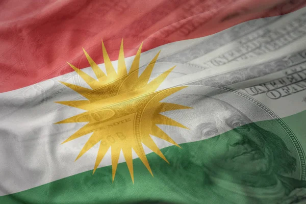 renkli Kürdistan ulusal bayrak Amerikan Doları para arka plan üzerinde sallayarak. Ekonomi kavramı